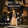 I Want Choo Eau de Parfum by Jimmy Choo showcased in a glamorous nighttime city setting with glowing lights and luxury evening atmosphere.