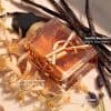 Yves Saint Laurent Libre Eau de Parfum Intense surrounded by vanilla pods, orange blossom flowers, and lavender highlighting the warm floral fragrance notes.