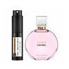 Chanel Chance Eau Tendre perfume with a pink bottle and spray.