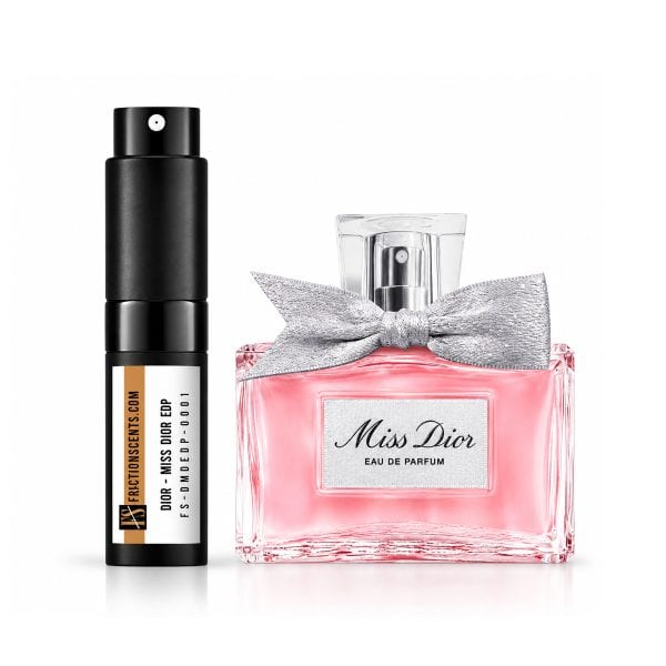 Elegant Miss Dior perfume bottle with pink liquid and silver bow.