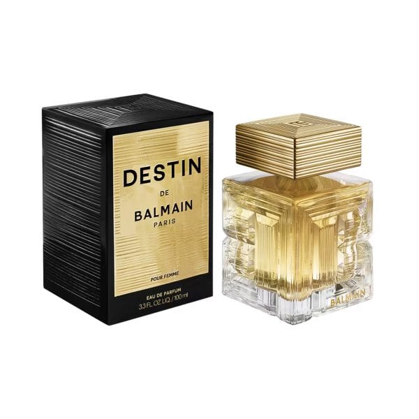 Luxury Balmain perfume bottle with gold cap and box, stylish and elegant.