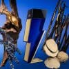 Stylish blue and gold perfume bottle with artistic natural elements.