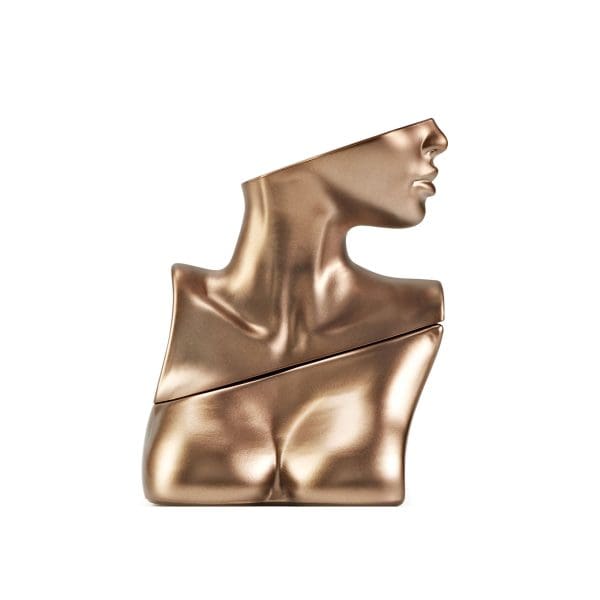 Stylish gold bust sculpture showcasing modern fragrance art.